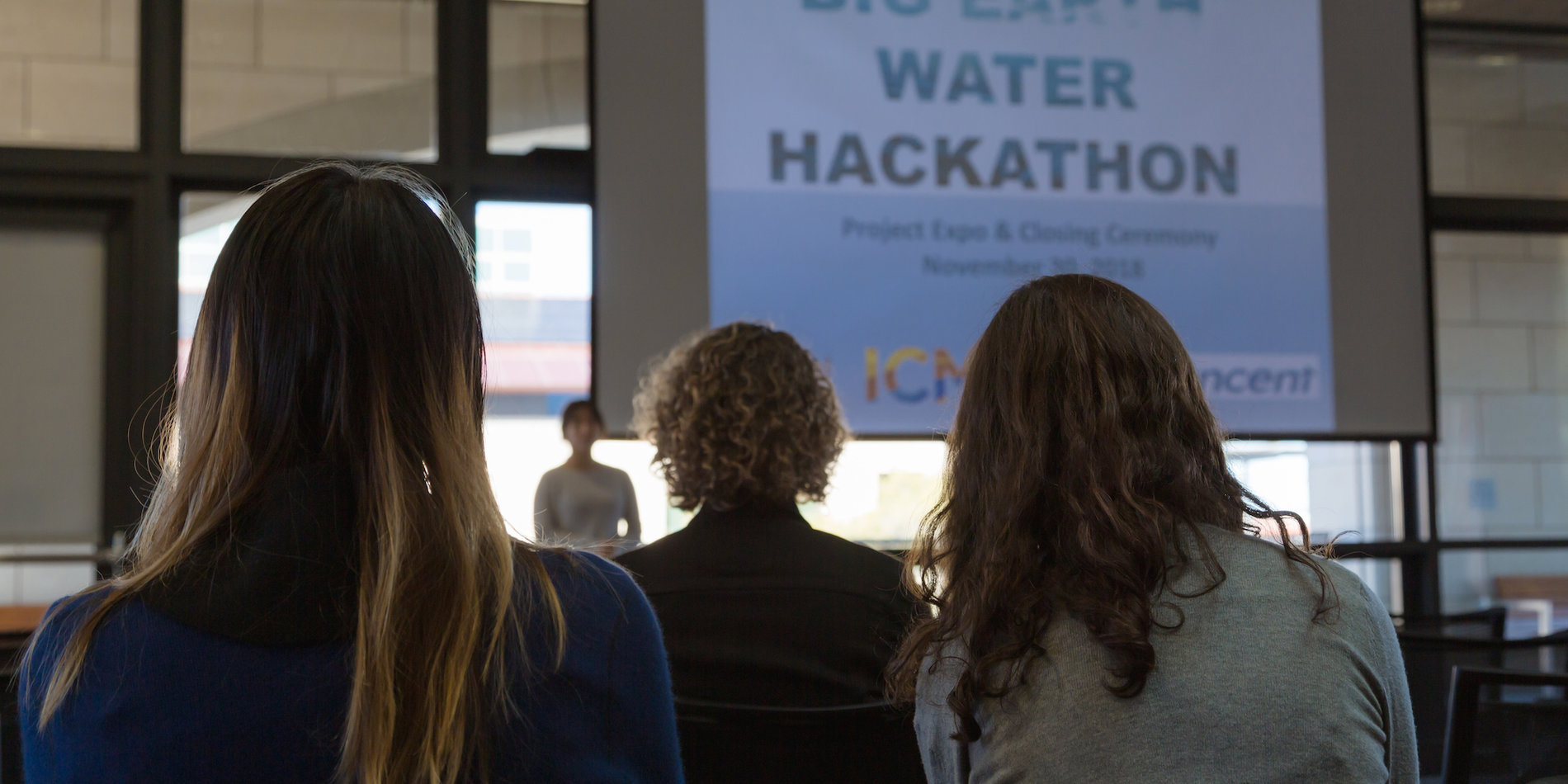 Students watching presentation.