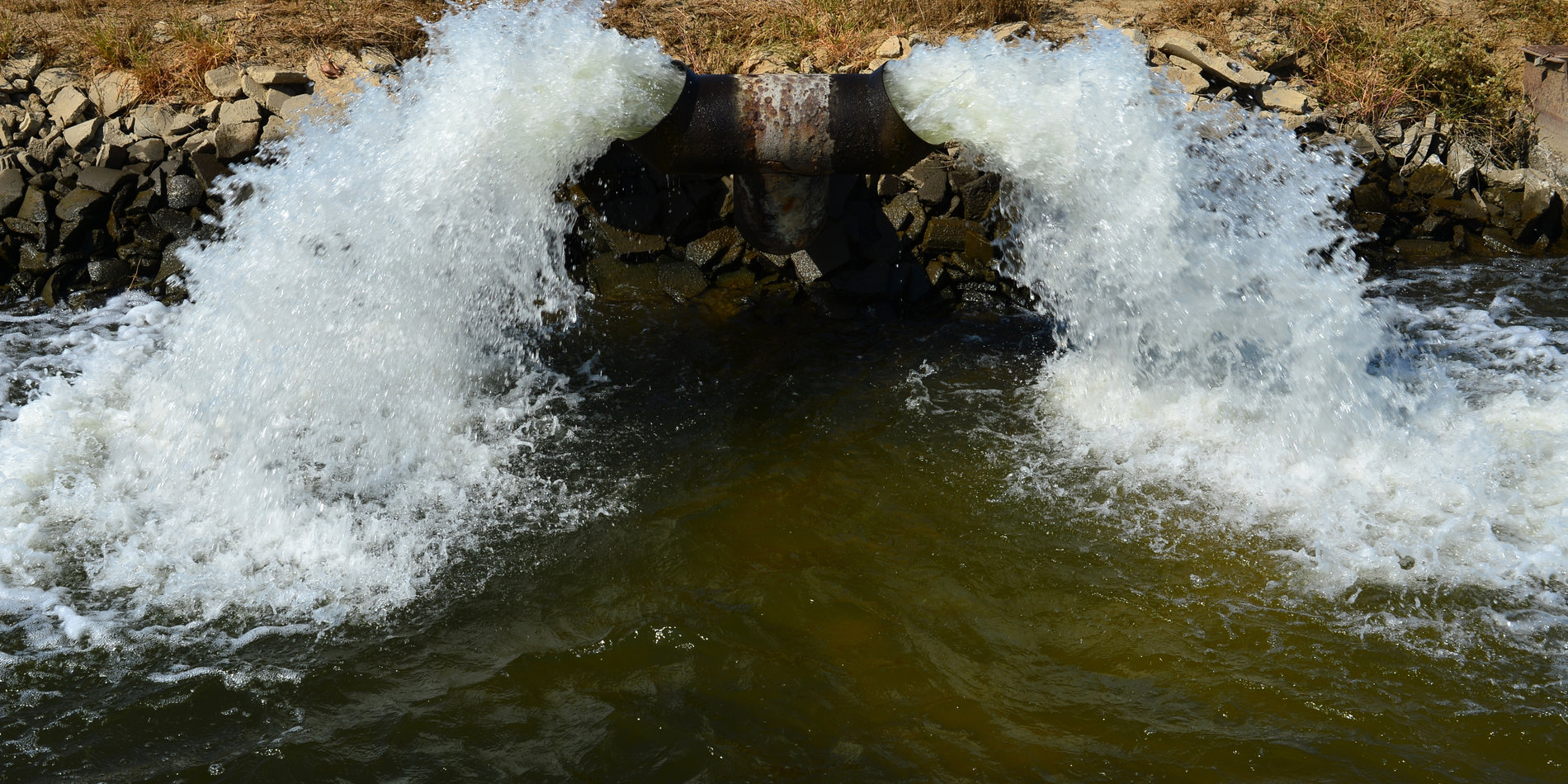 Water gushing from a pipe