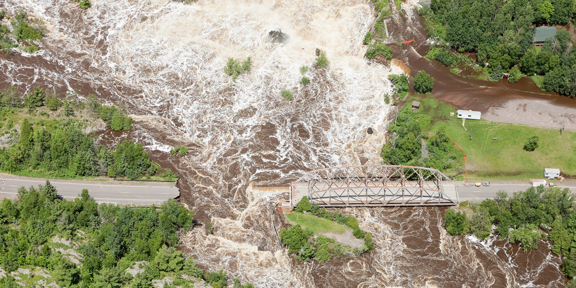 Road washed away by flooding