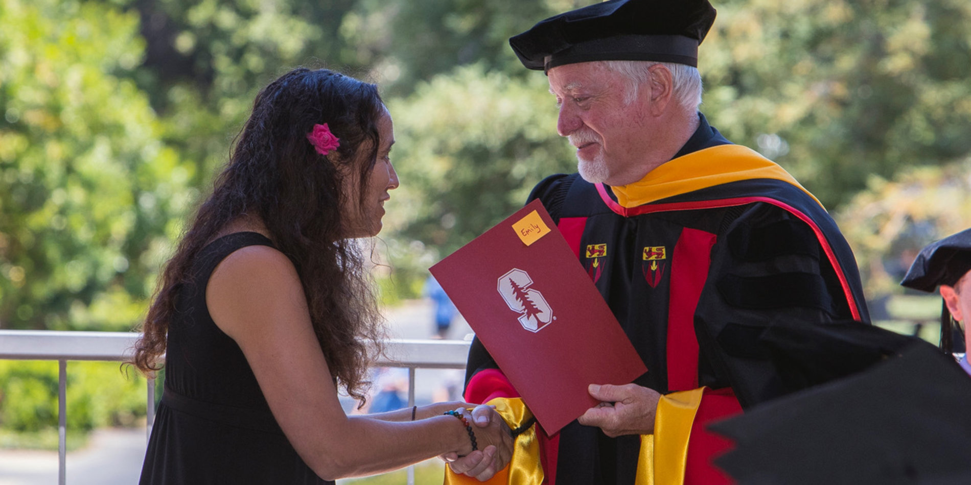 Emily Polk receiving 2019 Excellence in Teaching Award from Dean Graham.
