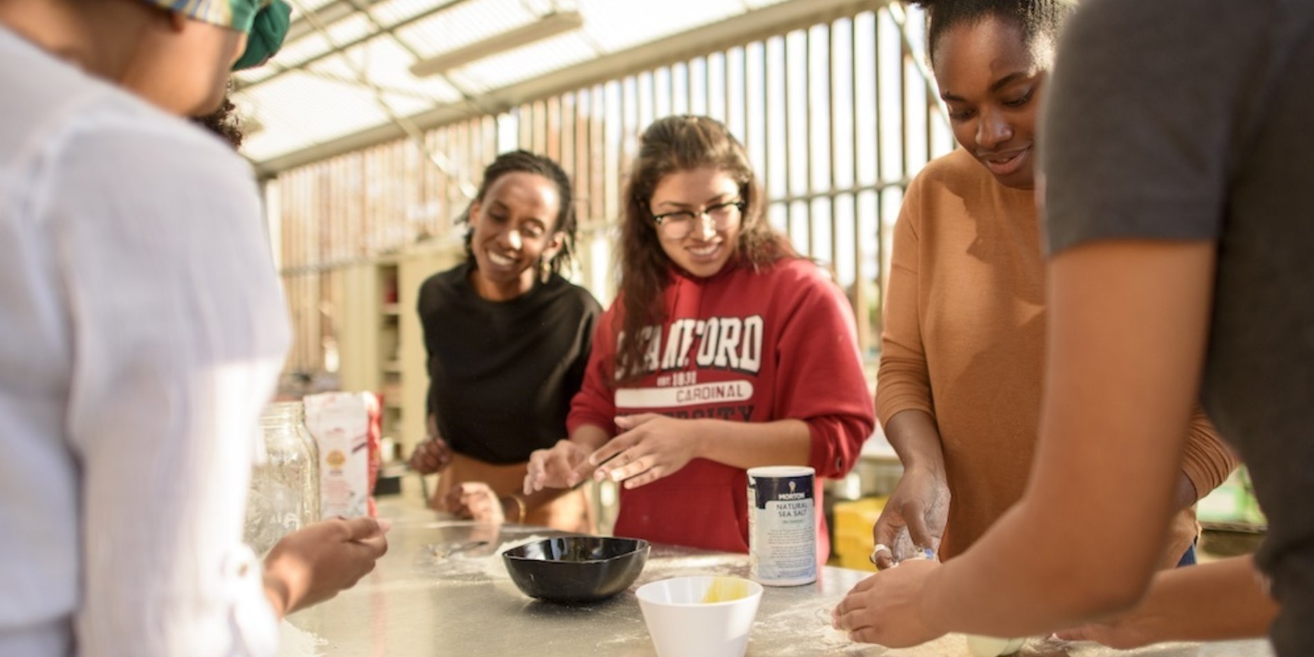 Students cooking at a facility on the O'Donohue Family Stanford Educatioinal Farm
