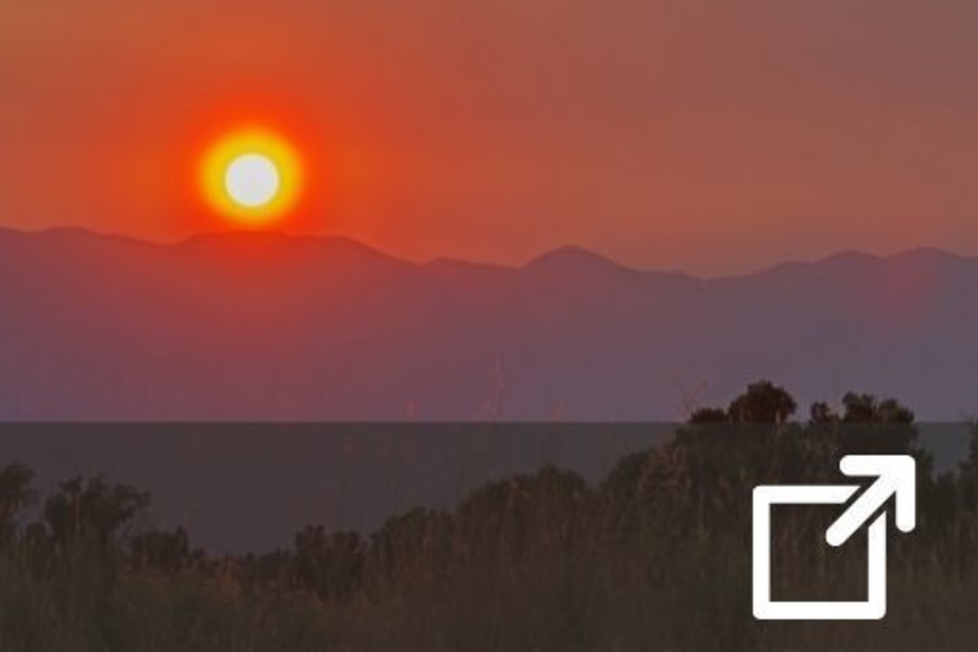 Smoky sunset over Sierra Nevada - external link