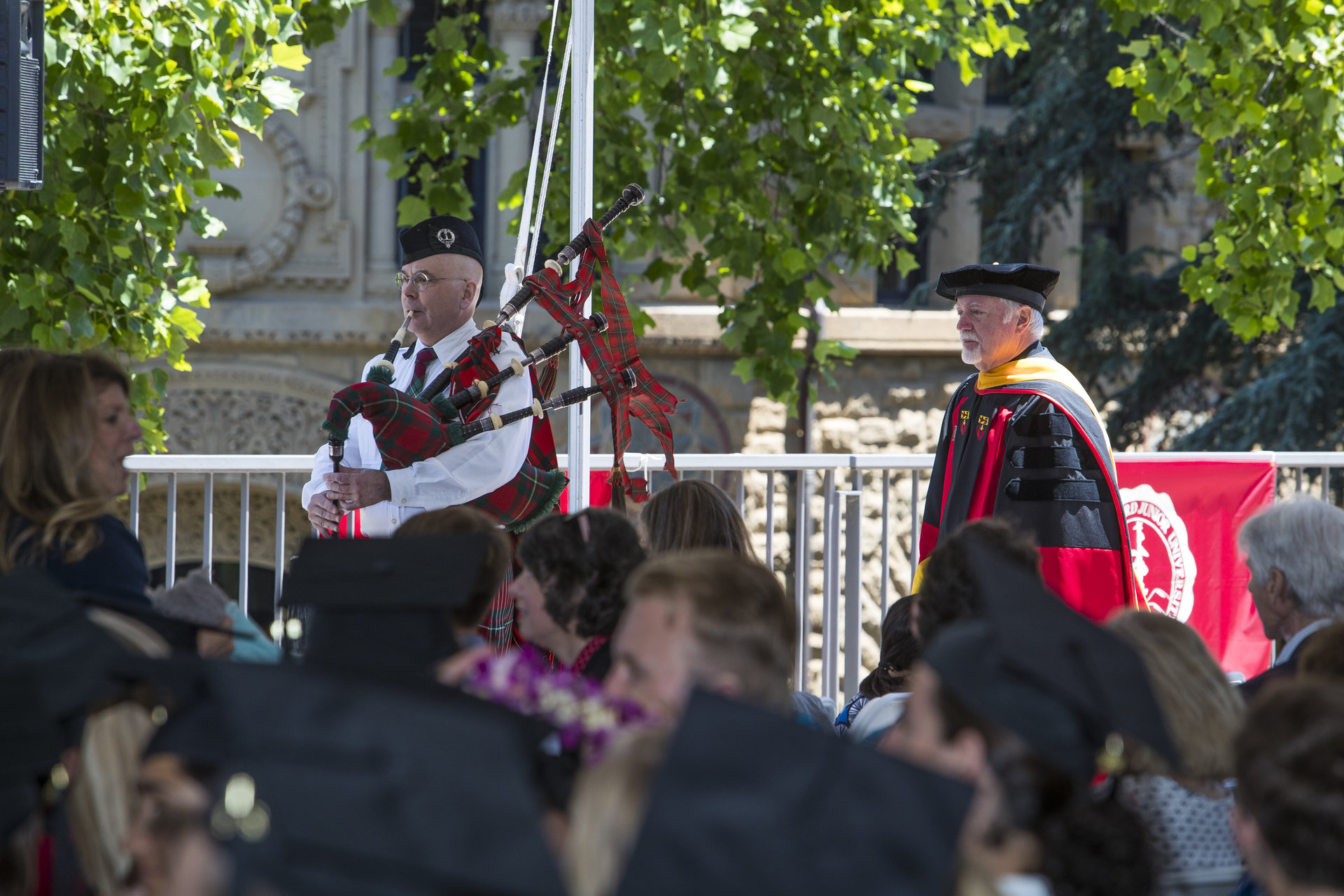 Bagpiper Marty Cawthon leads the procession.
