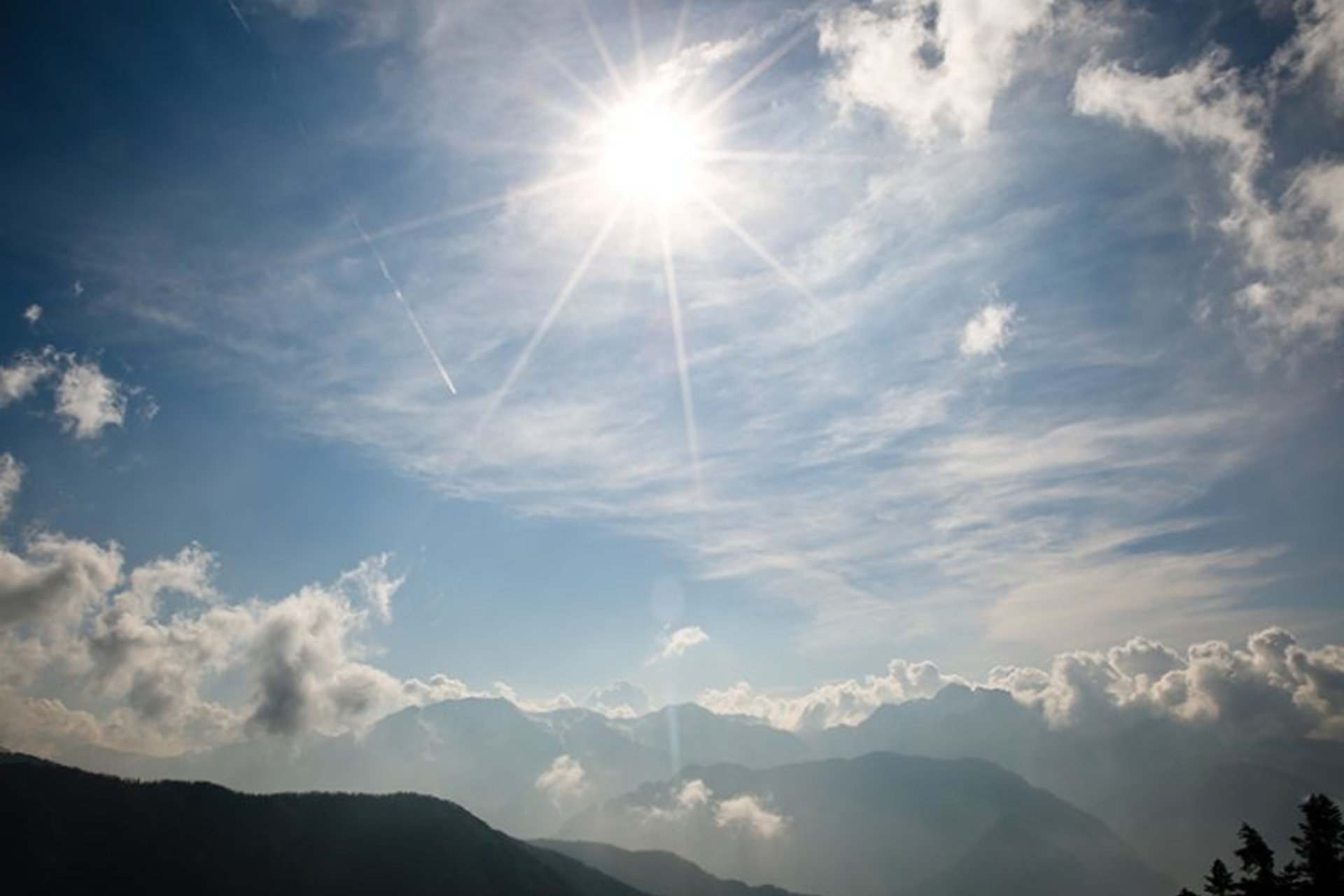 Sun shining through clouds