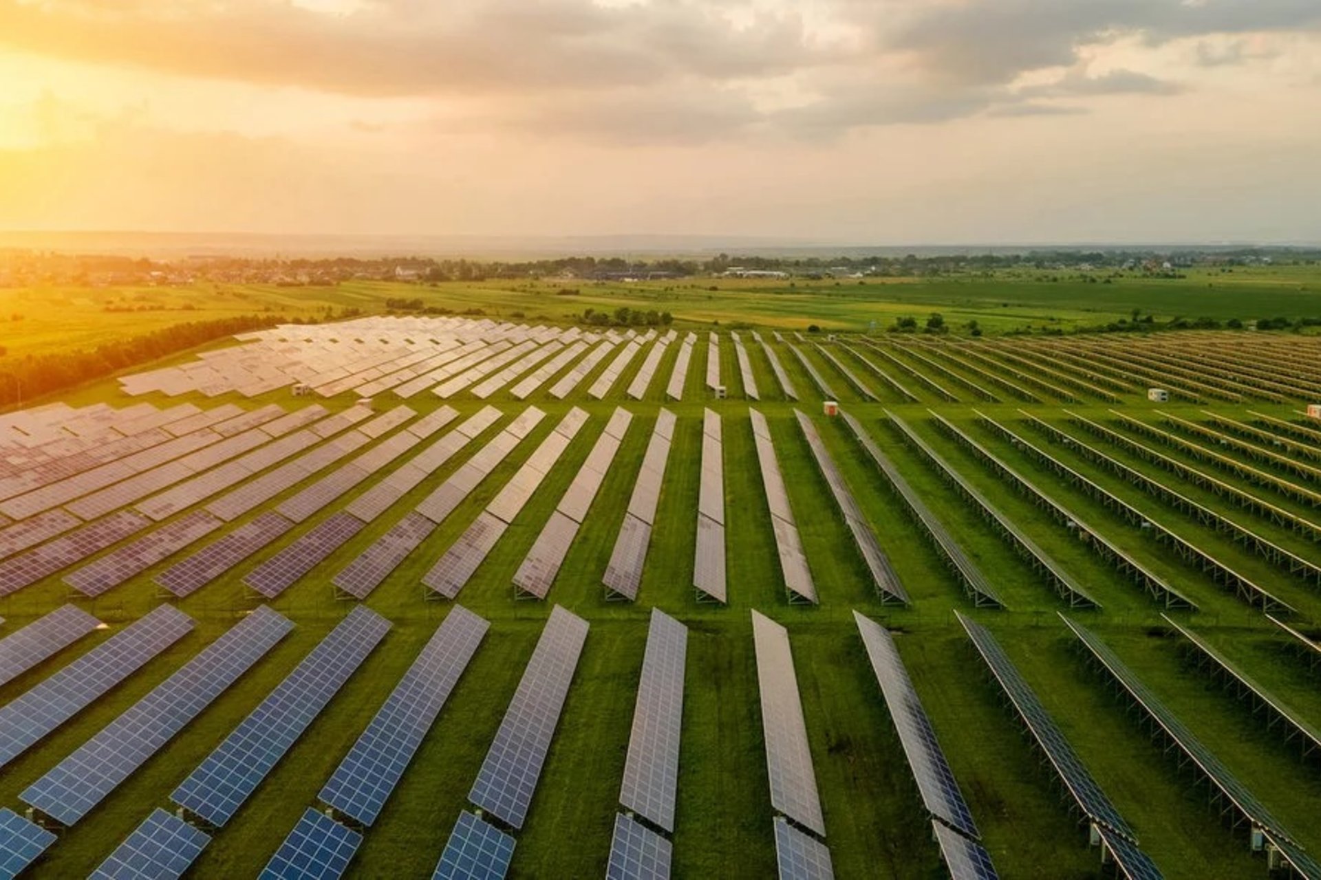 Sunset across field of solar panels