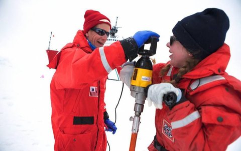 Professor and student with ice drill