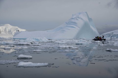 Eitan Rovero-Shein, MBA/MS E-IPER student, capturing fellow International Antarctic Expedition members in an "iceberg graveyard" in Neko Harbour, Antarctica.