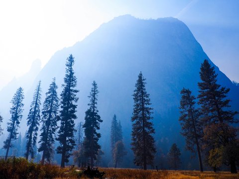 Smoke clouds the mountains in Yosemite after a series of fires. 