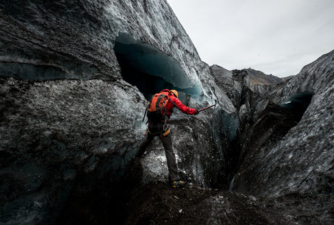 Student chipping at ice 