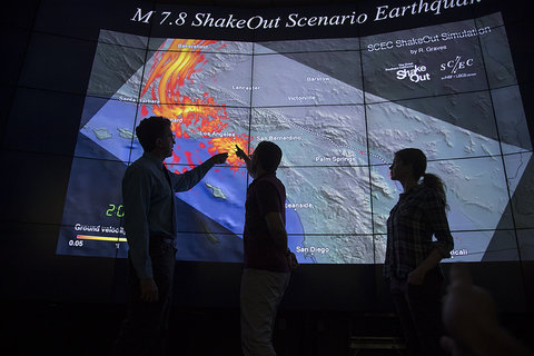 Greg Beroza pointing at earthquake simulation