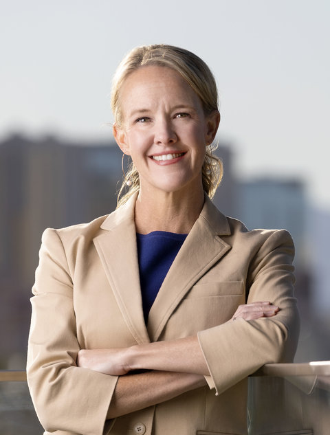 Kristen Averyt smiling with her arms crossed