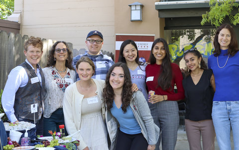 Group of people standing in front of Explore Energy House on Stanford's campus