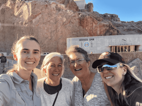 Selfie of four friends outside the Hoover Dam