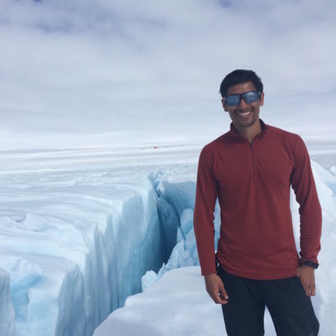 Sean Peters standing on a glacier