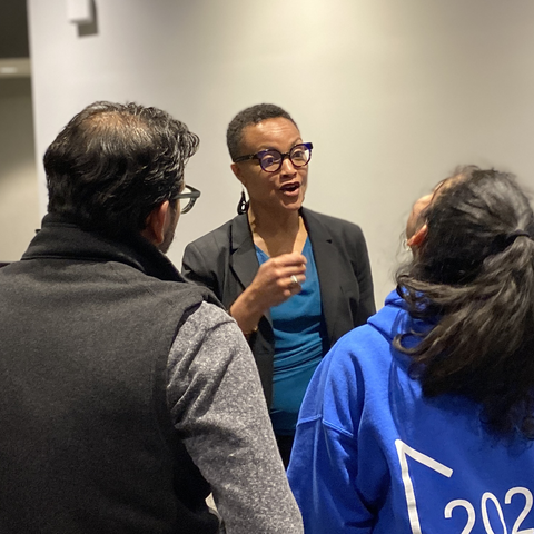 People chatting informally