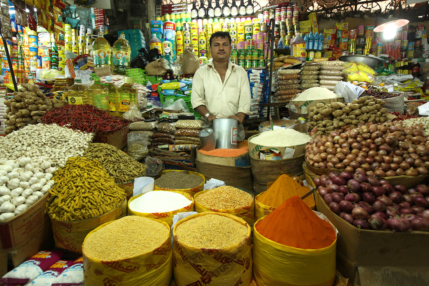 Merchant displaying spices