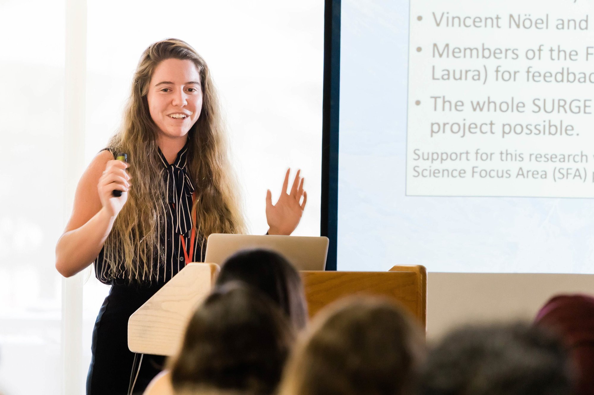A young woman speaks during the 2019 SURGE program