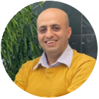Profile photo of Ali Namayandeh smiling with a green background
